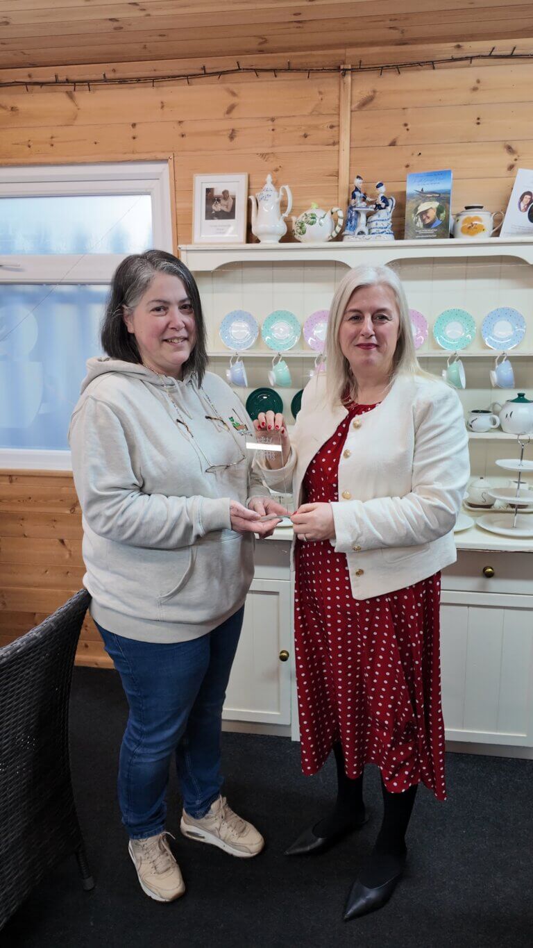 Me receiving the award from Michelle Welsh in the tearoom at Keycraft Garden Buildings