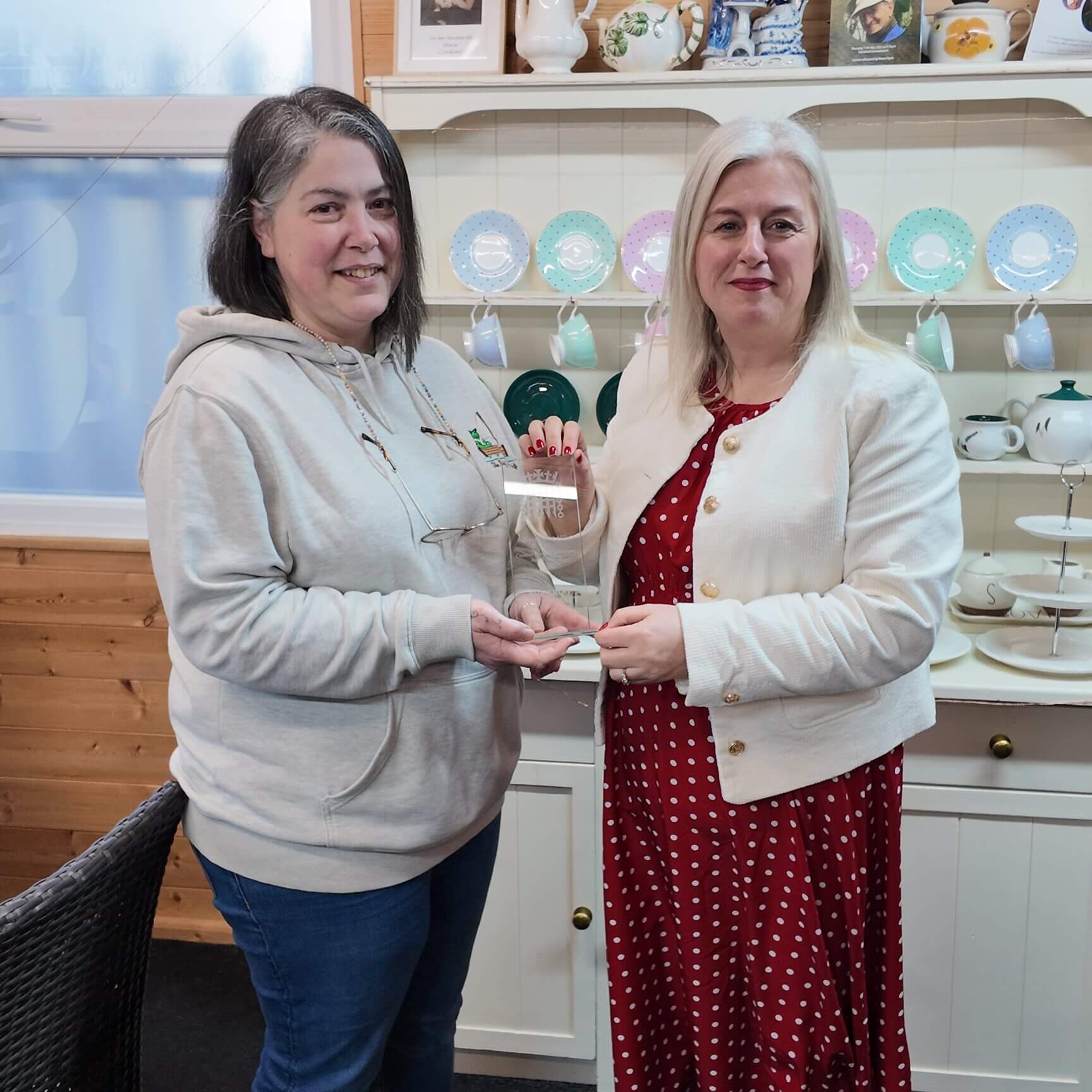 Me receiving the award from Michelle Welsh in the tearoom at Keycraft Garden Buildings